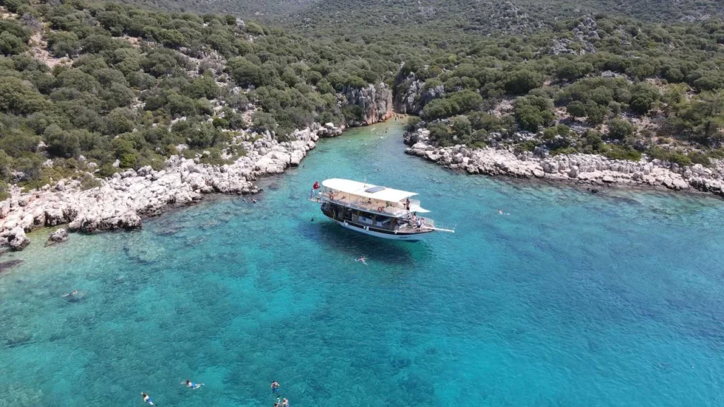 Boat and clear sea in İnönü Bay